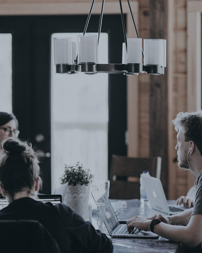 Recruiting consultants reviewing candidate shortlists together